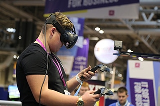 students using vr and controllers