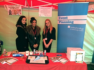 event planning students on their stall