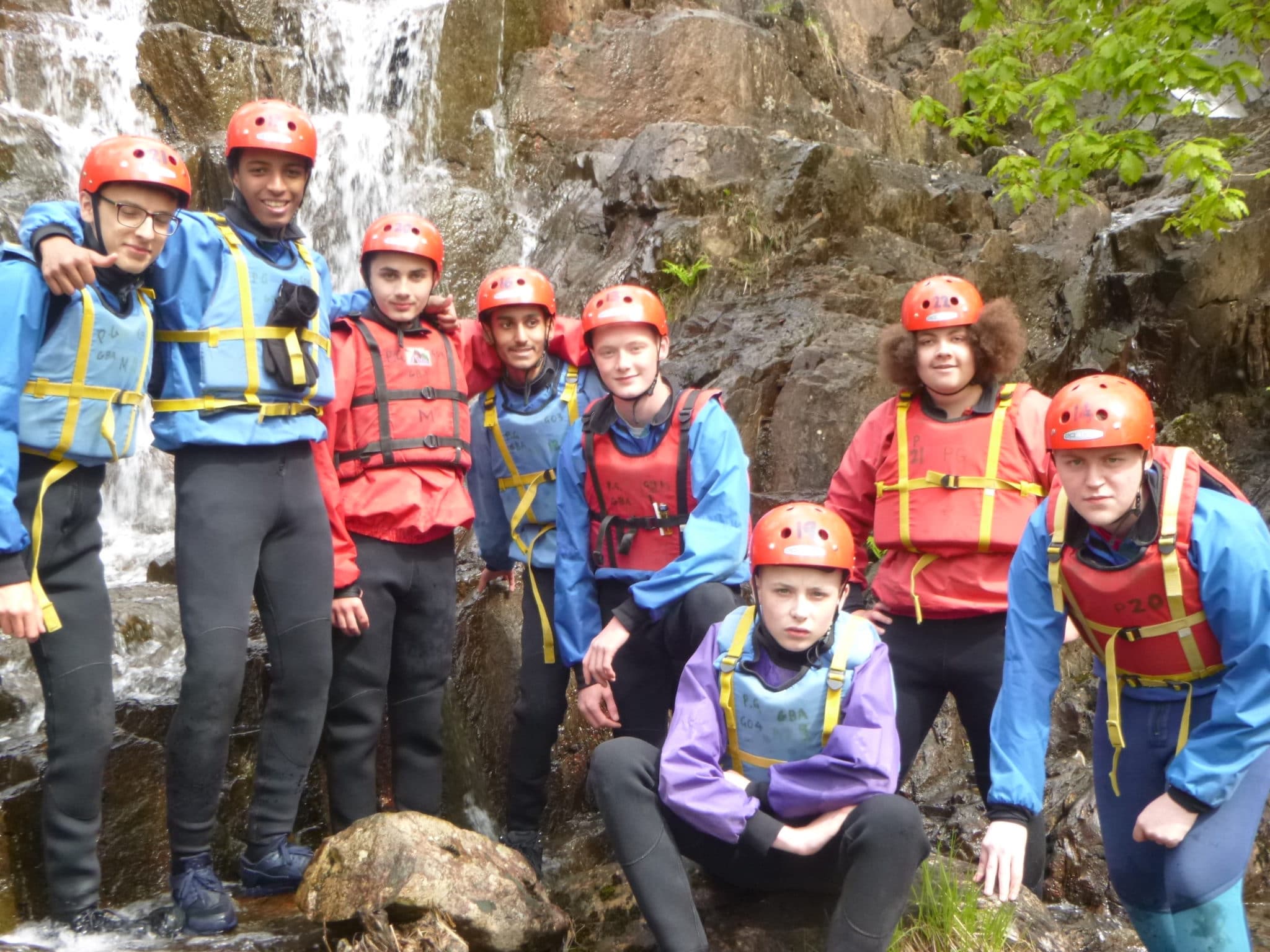 Students at a waterfall