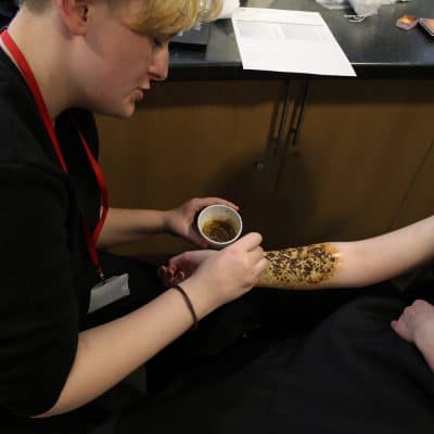 Keelin creating authentic injury make up in the studio.