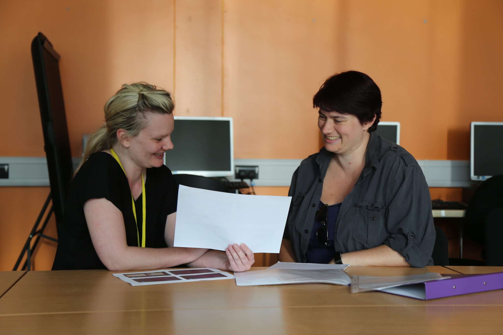 student and teacher discussing