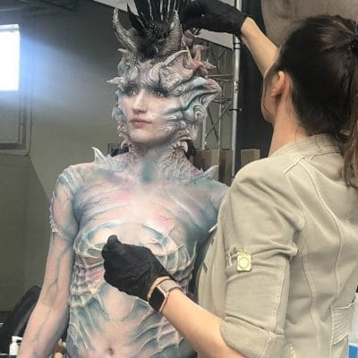 women sculpting sealife figure