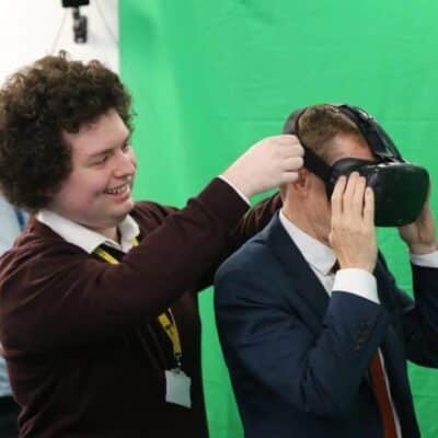 Adam Gwenter showing Mayor of the West Midlands Andy Street the Virgin Trains VR project.