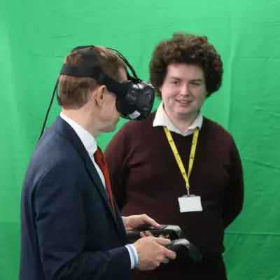 Adam Gwenter showing Mayor of the West Midlands Andy Street the Virgin Trains VR project.