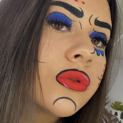 Student Georgia made up with pop art including blue eyes and cartoon lips