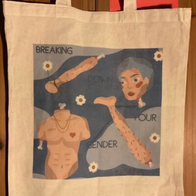 Eliza's tote bag design with her drawing featuring a torso and a woman figure