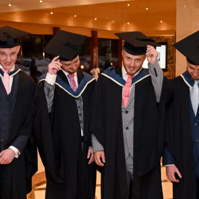 Graduates from solihull college tip their hats