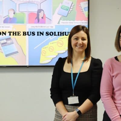 Holly and Sarah in front of their project presentation