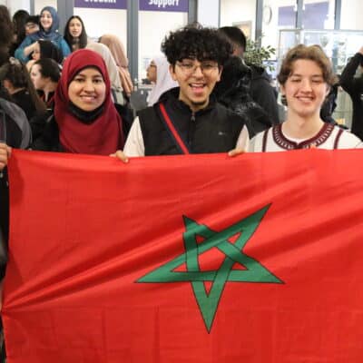 Students holding flag