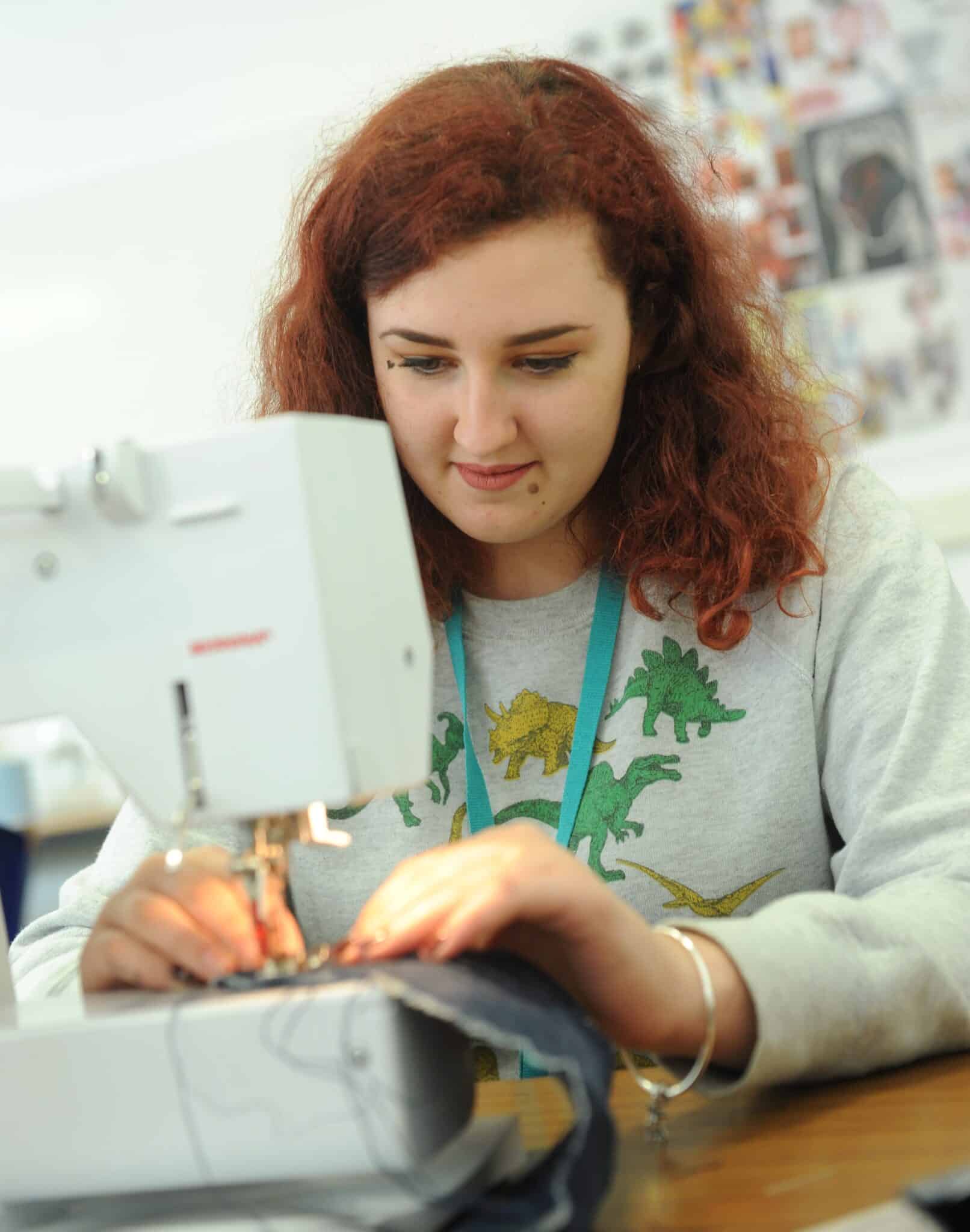 Student using a sewing machine