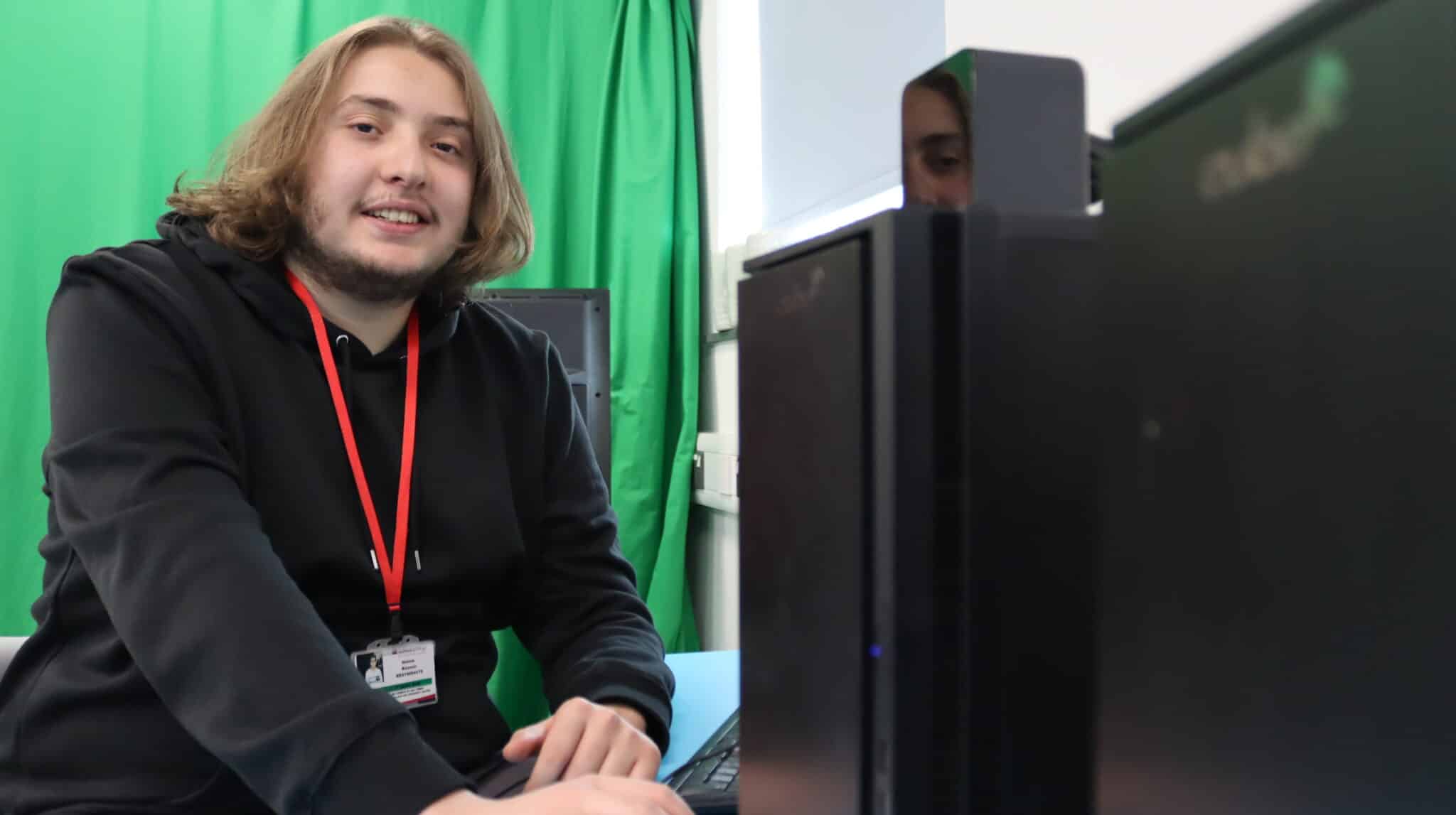 student sat in front of computer