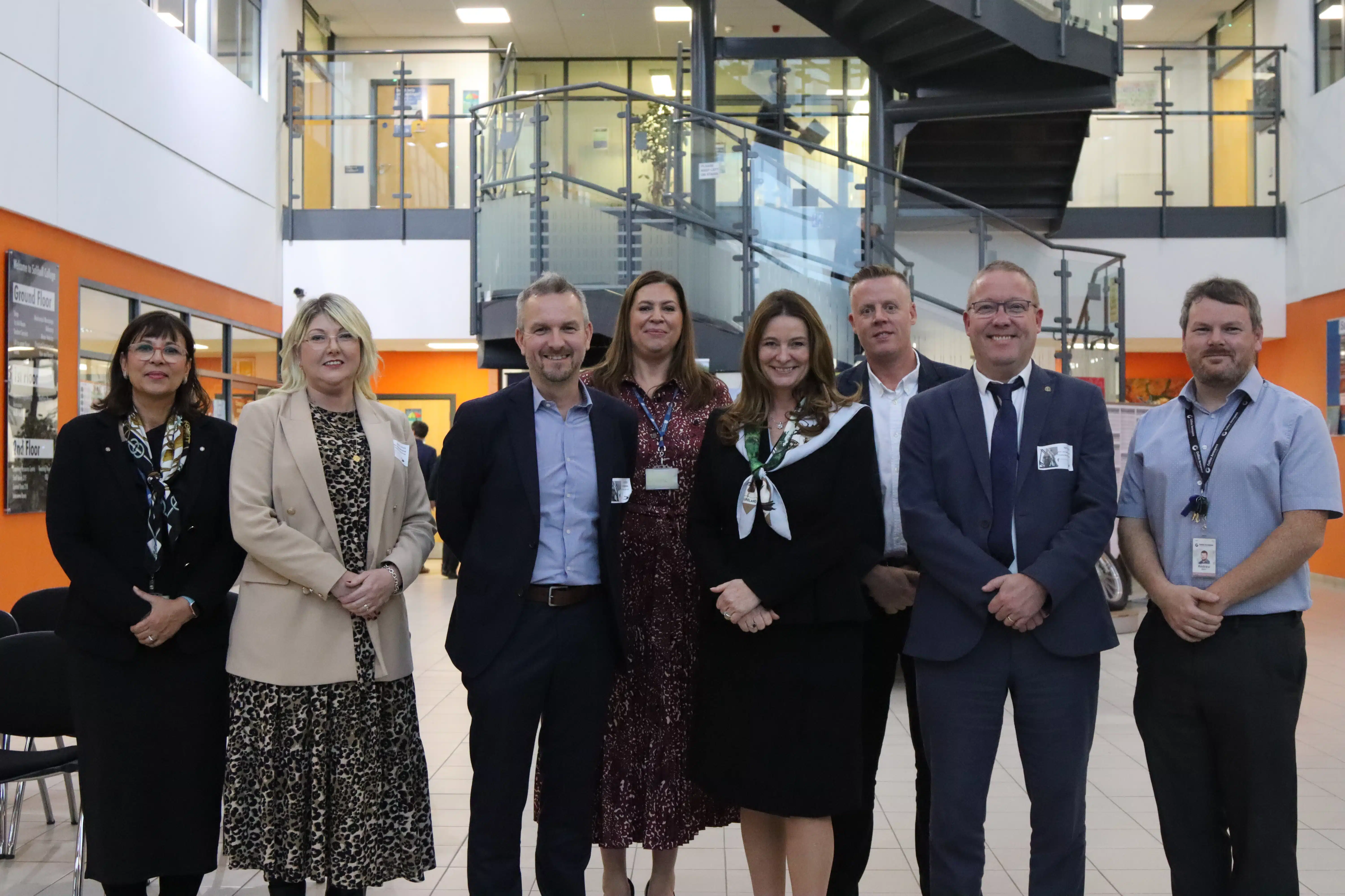 Employers standing in atrium with Gillian Keegan