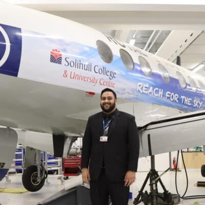 Jaz in front of plane