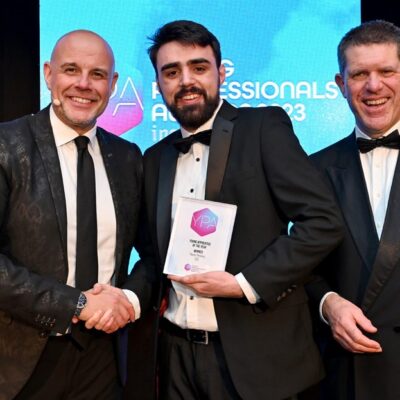 Owain Perkins posing with his award