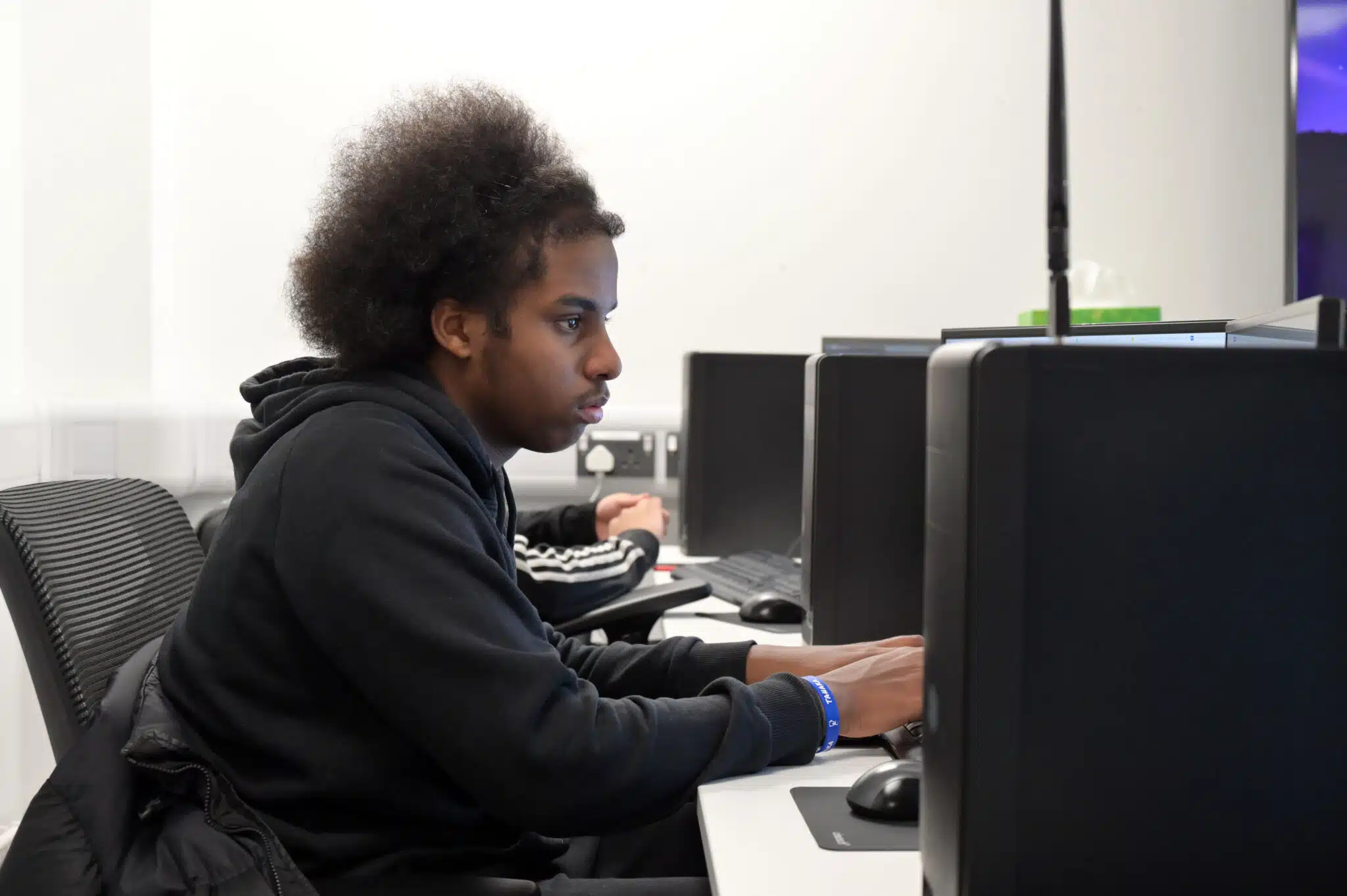 Student works at computer.