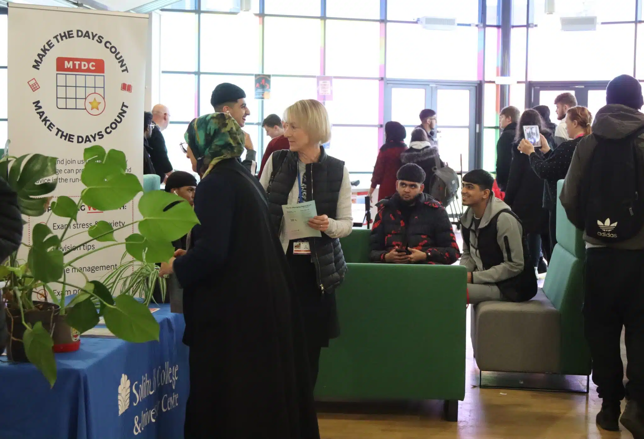 group of students in the college's common area