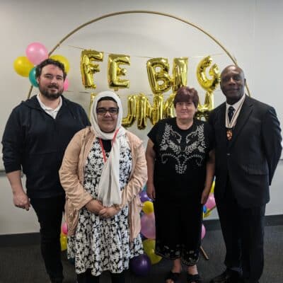 Deputy Lieutenant for the West Midlands, Everton Burke OBE, with guests at the afternoon tea