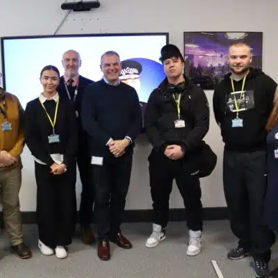 Sir David Thompson with Solihull College lecturers and students