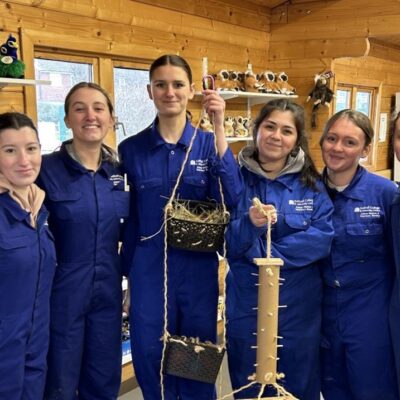 students with some of the things they made for the animals