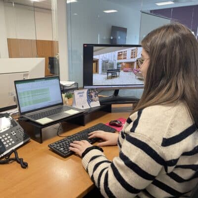 Apprentice Katie Hall at her desk at work