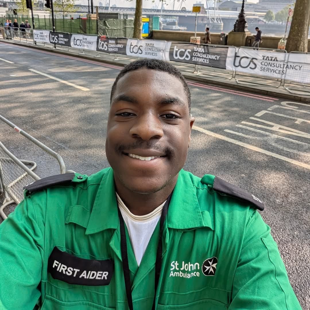 Tami wearing green st john ambulance first aider uniform