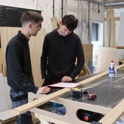 apprentices at a bench joinery company