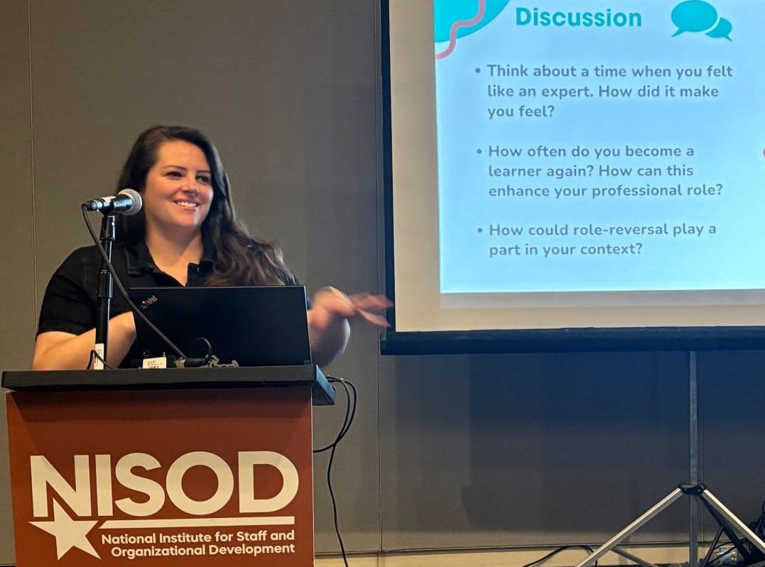 Rachel talking at the conference