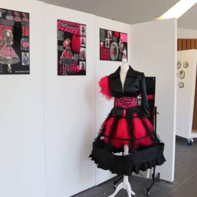 black and pink feminist outfit designed by Tiffany