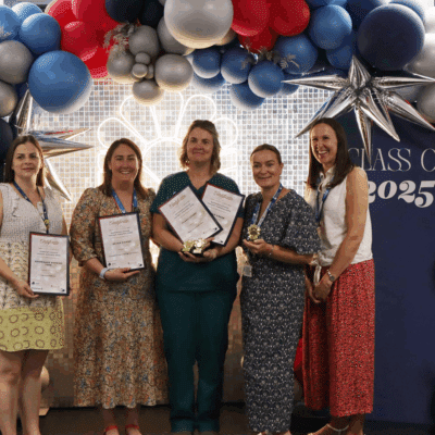 4 members of the veterinary nursing team with winner of apprentice of the year in the middle.