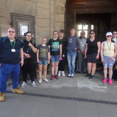 students and teachers standing in a group