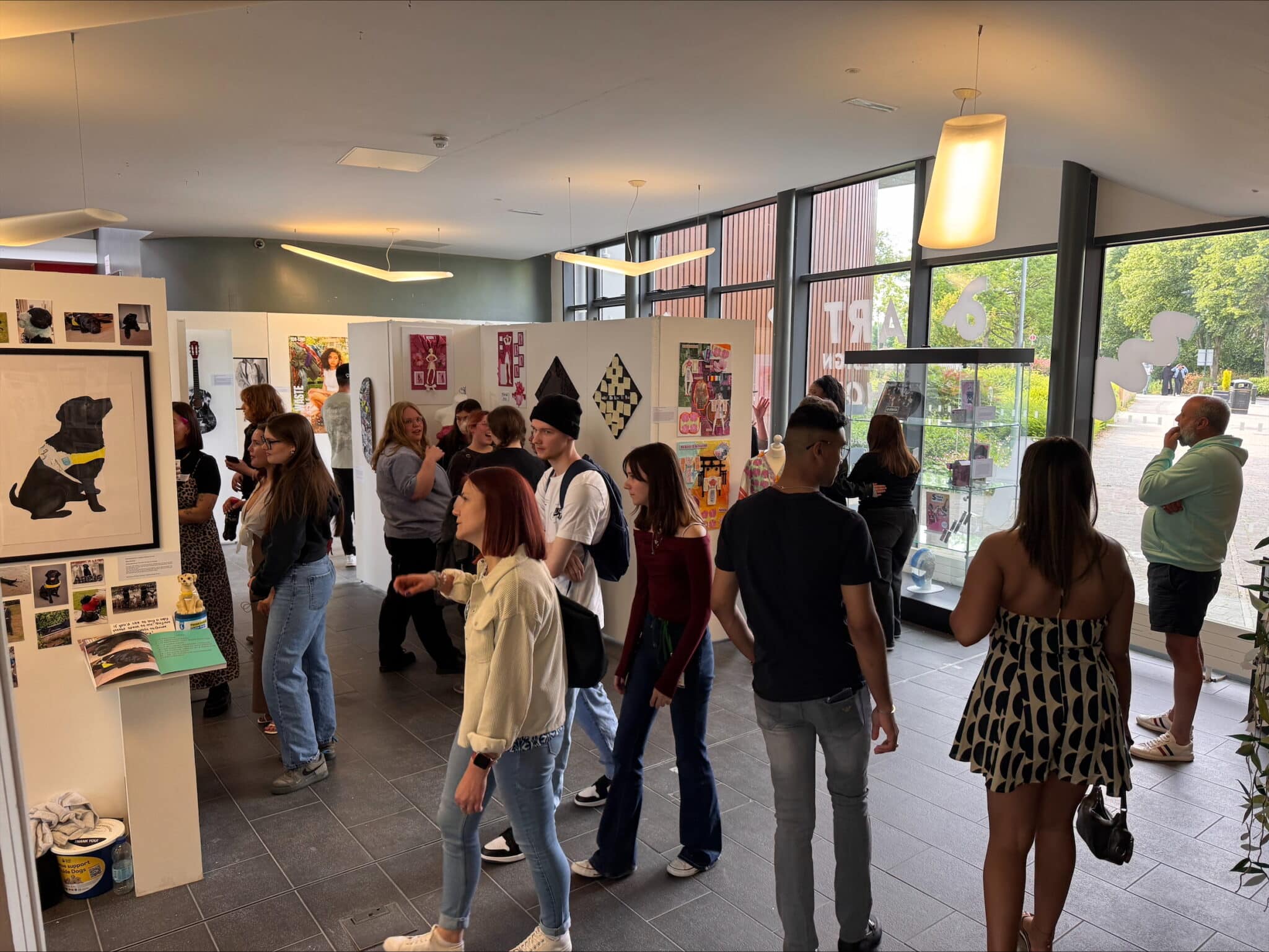 pic of people walking around the exhibition