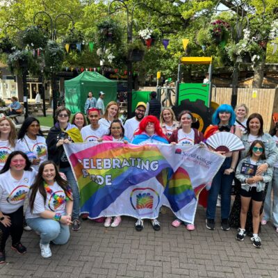 Staff and Students of the College pose with a Pride banner at Solihull Pride