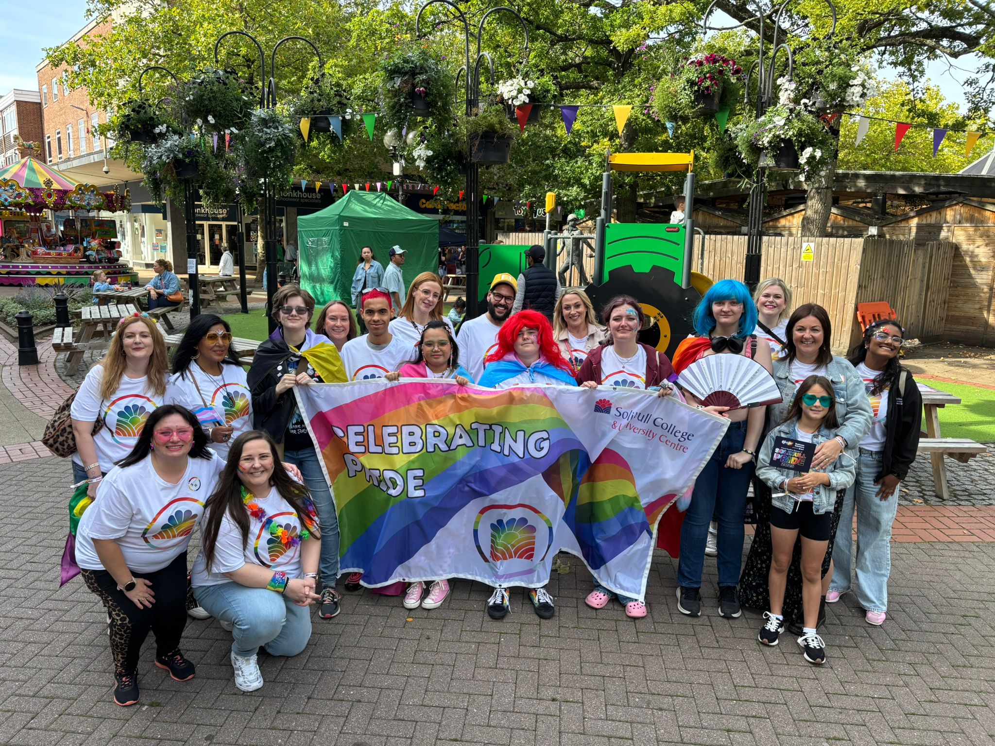 Staff and Students of the College pose with a Pride banner at Solihull Pride