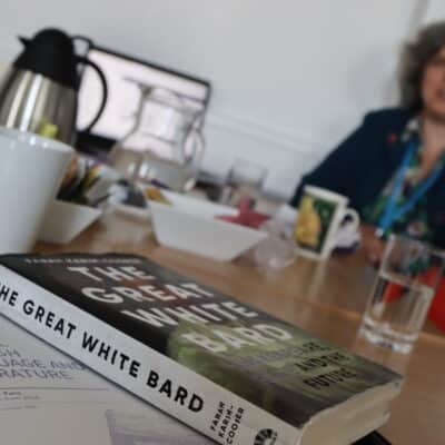 photo of megan wakefield with book in front