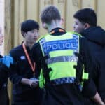 mock arrest involving 4 students, two in police officer vests