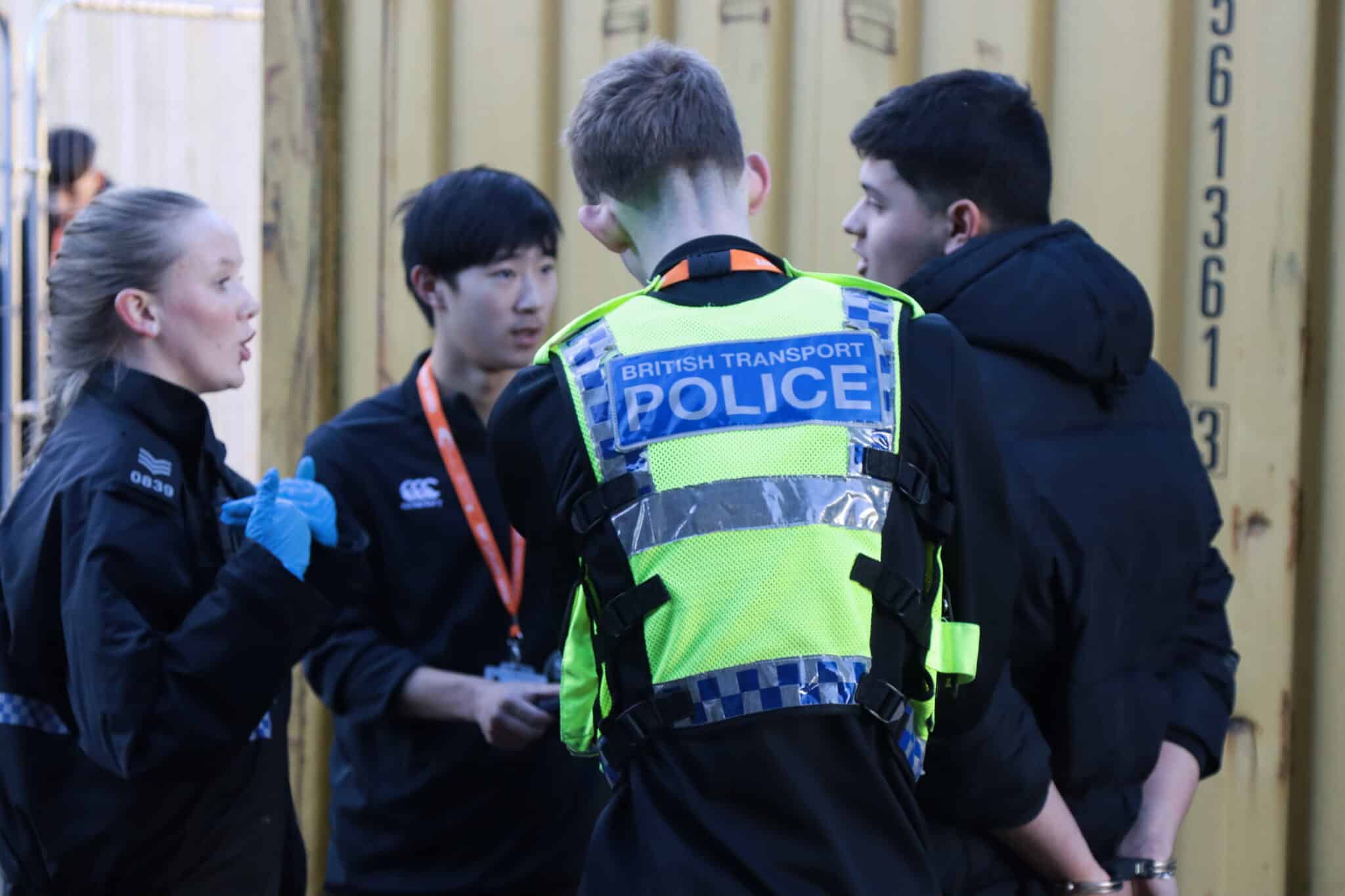 mock arrest involving 4 students, two in police officer vests