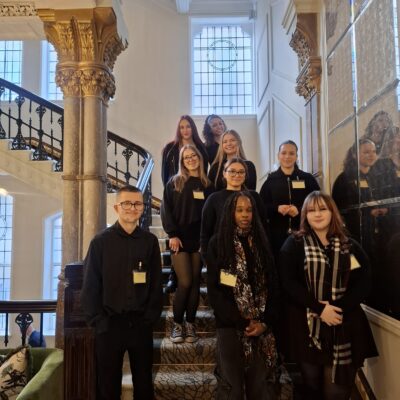 students at the staircase at the Grand Hotel in Birmingham