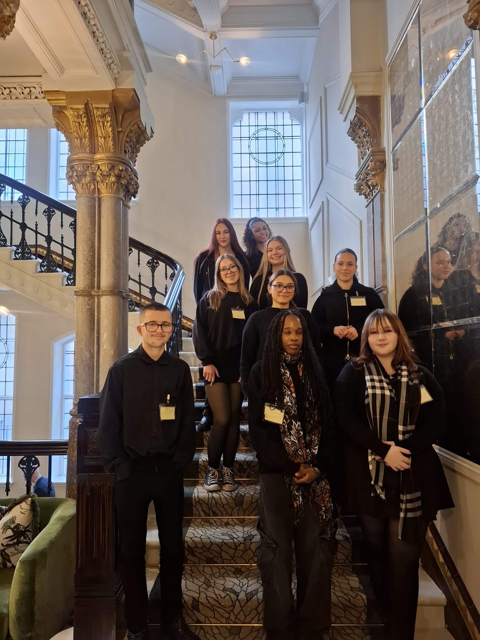 students at the staircase at the Grand Hotel in Birmingham