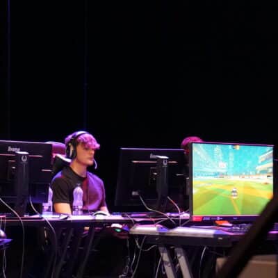 Students sat at a row of computers