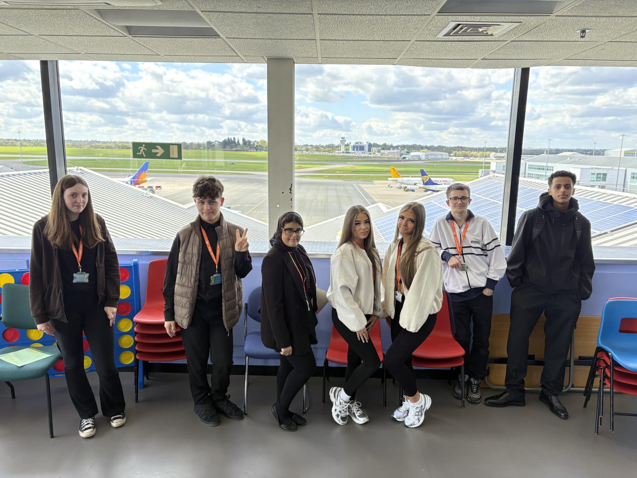 group shot of students at the airport