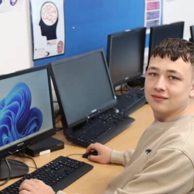 harvey morse sitting at a computer