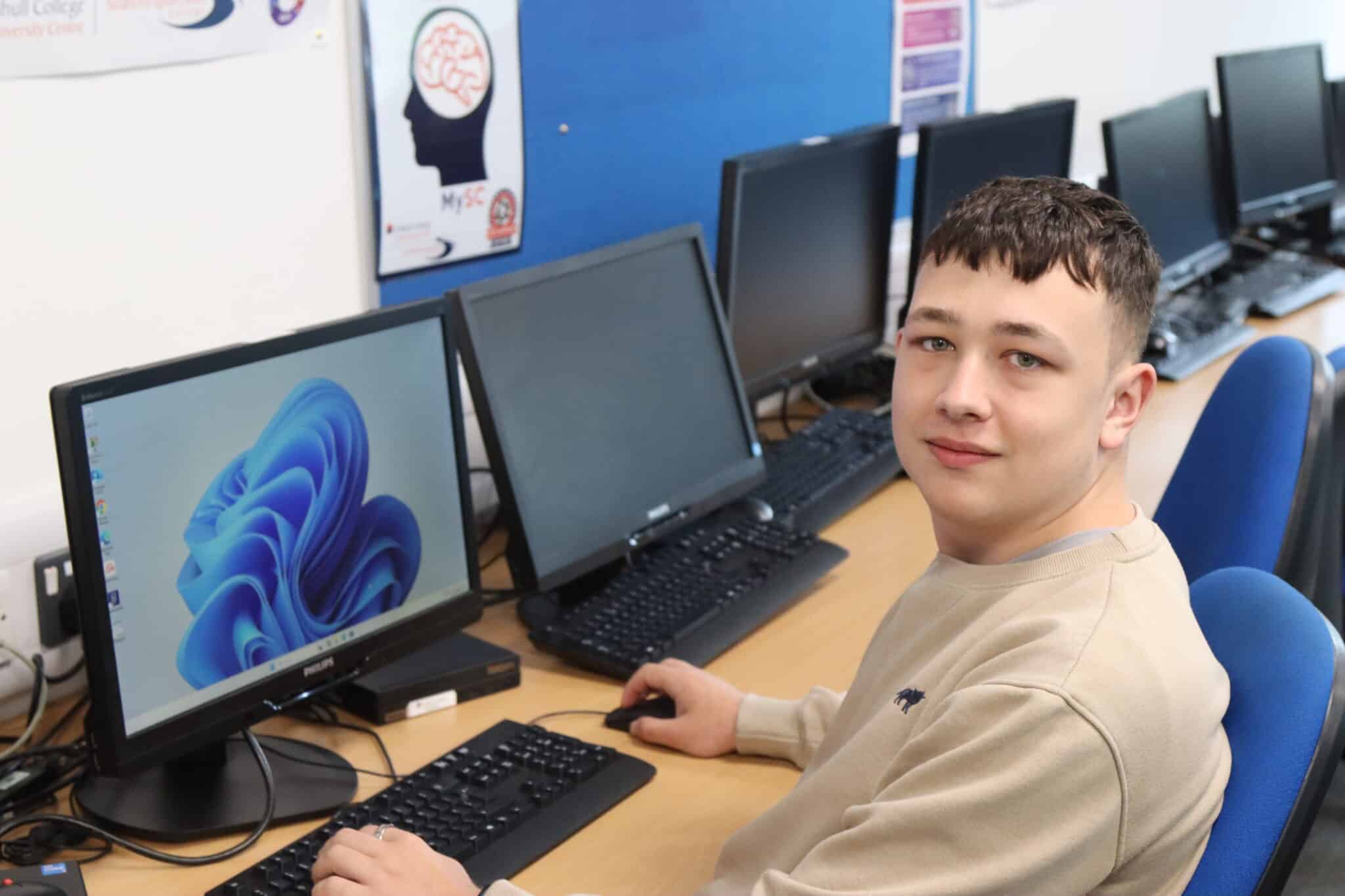 harvey morse sitting at a computer