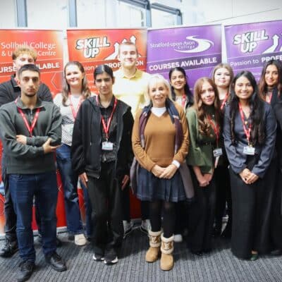 Principal Dr Rebecca Gater with Linda Plant and Fi Yates and the business students